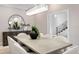Dining room featuring modern light fixture and neutral décor at 45 Adalia Ave, Tampa, FL 33606