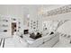 Beautiful living room featuring a fireplace, built-in shelving, and a view of the staircase at 45 Adalia Ave, Tampa, FL 33606