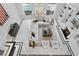 Overhead view of the living room, showcasing the fireplace and grand chandelier at 45 Adalia Ave, Tampa, FL 33606