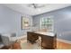 Charming office with hardwood floors, modern desk, and bright windows, creating an inspiring workspace at 45 Adalia Ave, Tampa, FL 33606
