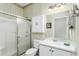 Clean bathroom with shower, toilet and vanity at 8048 Sanguinelli Rd, Land O Lakes, FL 34637