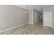 Bright dining room with hardwood floors and modern chandelier at 10985 Brightleaf Ct, Riverview, FL 33569