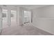 Upper-level laundry room with washer and dryer included in the home at 10985 Brightleaf Ct, Riverview, FL 33569