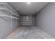 Garage with grey walls and wire shelving at 10209 Summerview Cir, Riverview, FL 33578