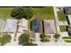 Aerial view showcasing three houses, ideal for real estate comparisons or neighborhood overviews at 10209 Summerview Cir, Riverview, FL 33578