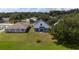 Aerial view of a house and backyard, showcasing the property's size and landscaping at 10209 Summerview Cir, Riverview, FL 33578