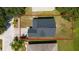 An aerial view showing the house's lot size and roofline, emphasizing its footprint and shape at 10209 Summerview Cir, Riverview, FL 33578