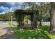 Community playground with pergola and play equipment at 10209 Summerview Cir, Riverview, FL 33578