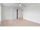 Spacious bedroom with wood-look flooring and a closet at 10061 Gulfstream Blvd, Englewood, FL 34224