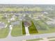 Aerial view of a single-story house with a large backyard and driveway at 10061 Gulfstream Blvd, Englewood, FL 34224
