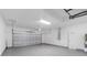 Spacious garage with ample storage and a high ceiling at 10061 Gulfstream Blvd, Englewood, FL 34224