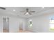 Spacious bedroom with ceiling fan and lots of natural light at 10061 Gulfstream Blvd, Englewood, FL 34224