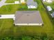 Side view of the house highlighting the roofline and landscaping at 10061 Gulfstream Blvd, Englewood, FL 34224