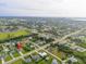 Aerial view showcasing the property and surrounding area at 10061 Gulfstream Blvd, Englewood, FL 34224