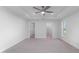 Bright and airy bedroom with large closet and ceiling fan at 10061 Gulfstream Blvd, Englewood, FL 34224