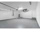 Two-car garage with storage space and epoxy floor at 10061 Gulfstream Blvd, Englewood, FL 34224
