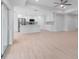 Open concept kitchen with stainless steel appliances and island at 10061 Gulfstream Blvd, Englewood, FL 34224