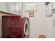 Laundry room with washer, dryer, and cabinets at 1029 Seagrape Dr, Ruskin, FL 33570