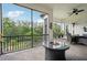 Relaxing screened lanai with fire pit and outdoor seating at 1029 Seagrape Dr, Ruskin, FL 33570