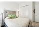 Bedroom with a queen bed and built-in closet at 1029 Seagrape Dr, Ruskin, FL 33570