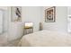 Bright bedroom with a comfortable bed and large windows at 1029 Seagrape Dr, Ruskin, FL 33570