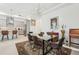 Bright dining area with a glass-top table and kitchen views at 1029 Seagrape Dr, Ruskin, FL 33570