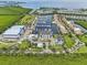 Aerial view of a waterfront community and marina at 1029 Seagrape Dr, Ruskin, FL 33570