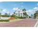 Little Harbor community entrance with brick road and lush landscaping at 1029 Seagrape Dr, Ruskin, FL 33570