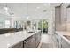 Modern kitchen with stainless steel appliances and an eat-in island at 1029 Seagrape Dr, Ruskin, FL 33570