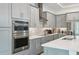 Modern kitchen with stainless steel appliances and an island at 1029 Seagrape Dr, Ruskin, FL 33570
