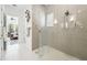 Large bathroom with walk-in shower and double vanity at 1029 Seagrape Dr, Ruskin, FL 33570