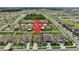 Aerial view of a residential area with a highlighted home location at 15407 Miller Creek Dr, Sun City Center, FL 33573