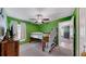 bedroom with a bunk bed and green walls at 15407 Miller Creek Dr, Sun City Center, FL 33573