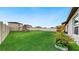 Spacious backyard with grassy area and playset at 15407 Miller Creek Dr, Sun City Center, FL 33573