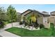 Single-story home with a landscaped front yard, driveway, and two-car garage at 15407 Miller Creek Dr, Sun City Center, FL 33573
