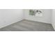 Cozy bedroom with carpet, natural light, and clean design at 4285 Big Sky Dr, Spring Hill, FL 34604