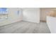 Carpeted bedroom with neutral walls and two windows for natural light at 4285 Big Sky Dr, Spring Hill, FL 34604