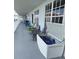 Shared hallway with chairs and storage at 445 Hamden Dr # 505, Clearwater Beach, FL 33767