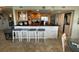Kitchen with breakfast bar and granite countertops at 445 Hamden Dr # 505, Clearwater Beach, FL 33767