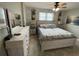 Spacious bedroom with a king-size bed and dresser at 445 Hamden Dr # 505, Clearwater Beach, FL 33767