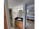 Bathroom with vanity, toilet and a view into another room at 445 Hamden Dr # 505, Clearwater Beach, FL 33767