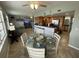 Dining area with table and kitchen view at 445 Hamden Dr # 505, Clearwater Beach, FL 33767