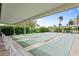 Enjoy a game of shuffleboard under the covered patio at 7400 Sun Island S Dr # 407, South Pasadena, FL 33707