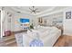 Living room with sectional sofa, access to lanai and pool at 13769 Old Creek Ct, Parrish, FL 34219