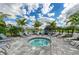 Relaxing hot tub surrounded by lounge chairs at 13769 Old Creek Ct, Parrish, FL 34219