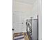 Convenient laundry room with washer, dryer, and ample cabinet space at 13769 Old Creek Ct, Parrish, FL 34219