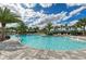 Resort-style pool with plenty of lounge chairs at 13769 Old Creek Ct, Parrish, FL 34219