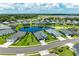 Community overview showcasing lakefront homes and landscaping at 13769 Old Creek Ct, Parrish, FL 34219