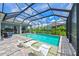 Resort-style pool with a spacious patio and plenty of seating at 13769 Old Creek Ct, Parrish, FL 34219