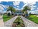 Attractive community entrance with landscaping and signage at 13769 Old Creek Ct, Parrish, FL 34219